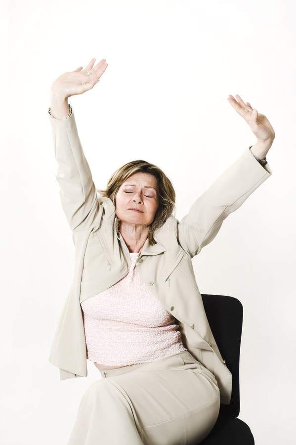 Business woman stretching on chair over white. Business woman stretching on chair over white