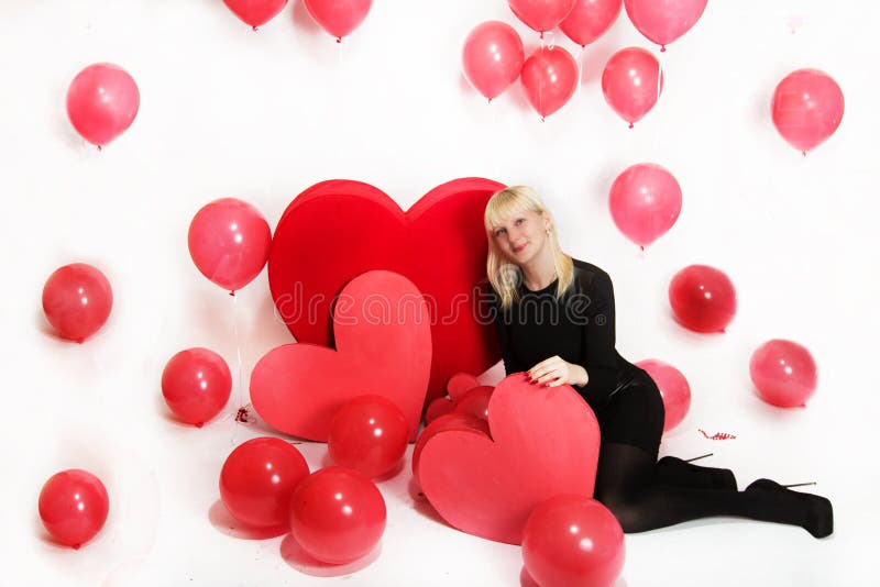 Het blondemeisje kleedde zich als playboykonijntje voor de dag van Valentine royalty-vrije stock foto's Het blondemeisje kleedde zich als playboykonijntje voor de dag van Valentine royalty-vrije stock foto's