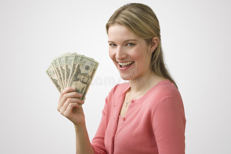 Het Contante geld van de Holding van de vrouw stock afbeeldingen Het Contante geld van de Holding van de vrouw stock afbeeldingen