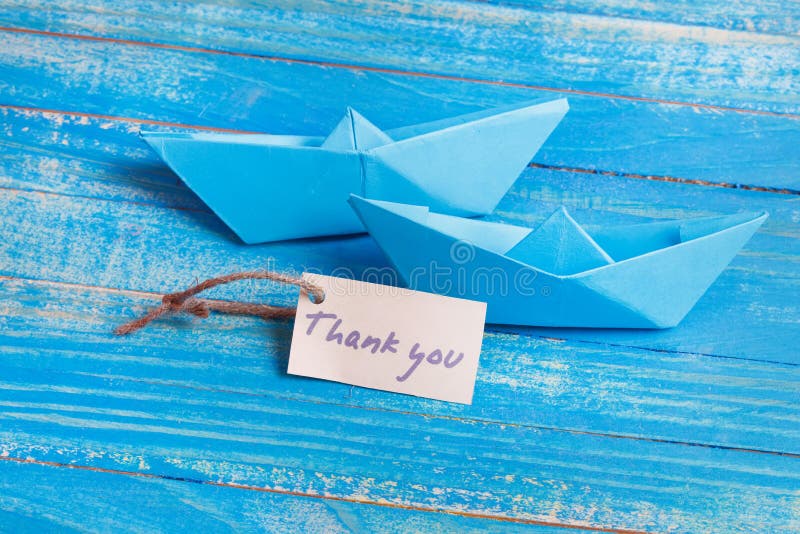 Het etiket met de Woorden dankt u Document Boot met een teken royalty-vrije stock foto's