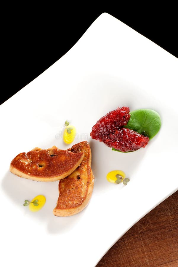 Het fijne dineren, Geroosterde foie gras stock afbeelding Het fijne dineren, Geroosterde foie gras stock afbeelding