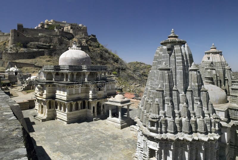 Kumbhalgarth hilltop fort with Hindu temples in the foreground. In the Aravalli Hills near Udaipur in the Rajasthan region of western India. Kumbhalgarth hilltop fort with Hindu temples in the foreground. In the Aravalli Hills near Udaipur in the Rajasthan region of western India.