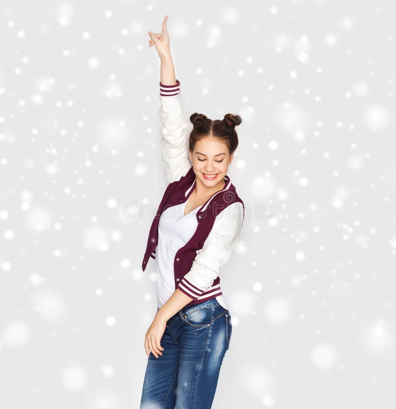 Het gelukkige het glimlachen mooie tiener dansen royalty-vrije stock foto Het gelukkige het glimlachen mooie tiener dansen royalty-vrije stock foto