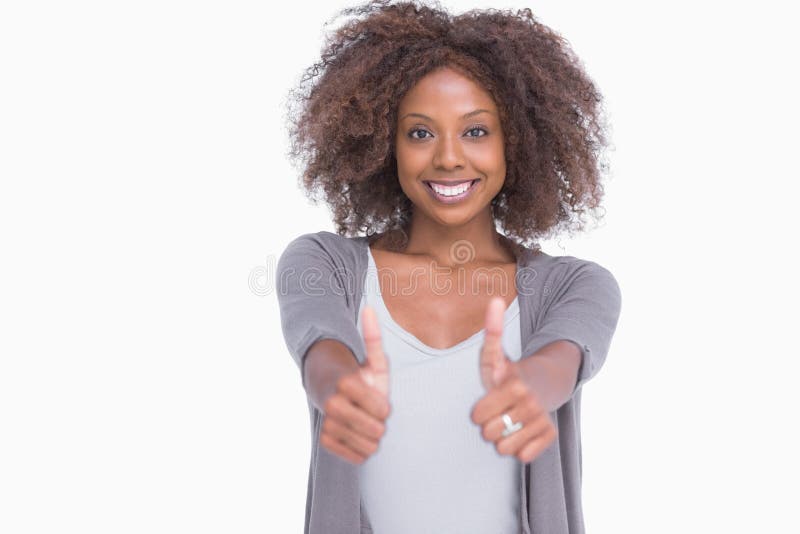 Happy woman giving thumbs up on white background. Happy woman giving thumbs up on white background