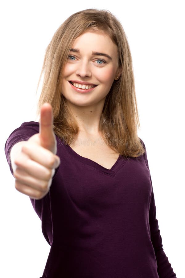 Het gemotiveerde jonge vrouw geven duimen omhoog stock afbeeldingen Het gemotiveerde jonge vrouw geven duimen omhoog stock afbeeldingen