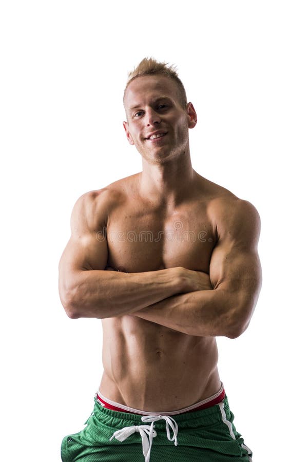 Het geschikte shirtless mannelijke model stellen met heel wat vertrouwen, gekruiste wapens stock afbeeldingen Het geschikte shirtless mannelijke model stellen met heel wat vertrouwen, gekruiste wapens stock afbeeldingen