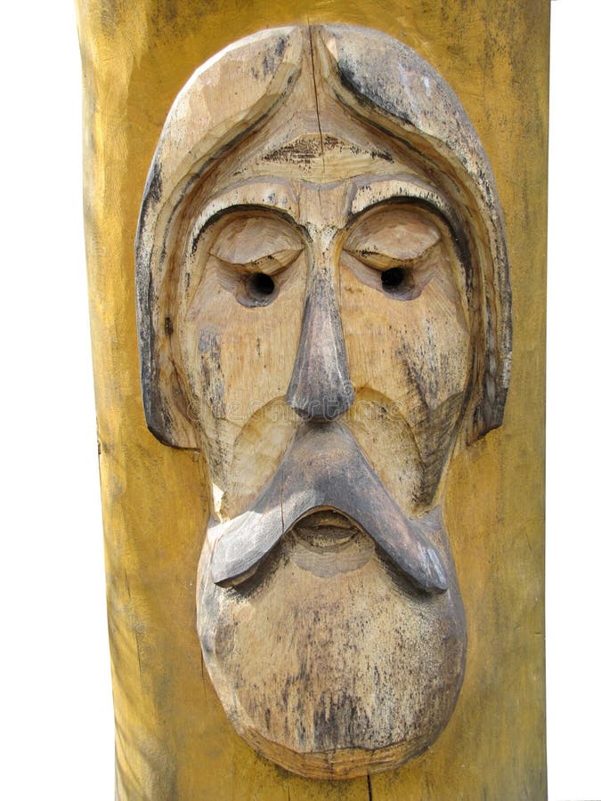 Het gezicht van een oude wijze die van hout wordt gemaakt dat op witte achtergrond wordt geïsoleerd royalty-vrije stock fotografie Het gezicht van een oude wijze die van hout wordt gemaakt dat op witte achtergrond wordt geïsoleerd royalty-vrije stock fotografie