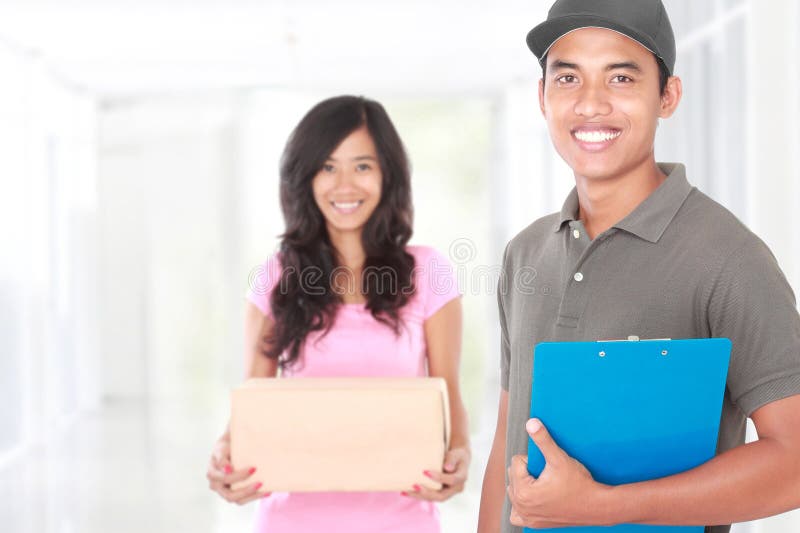 Smiling delivery guy after sending package to woman. Smiling delivery guy after sending package to woman