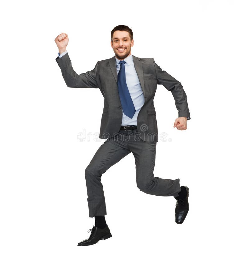 Het glimlachen zakenman het springen stock foto Het glimlachen zakenman het springen stock foto