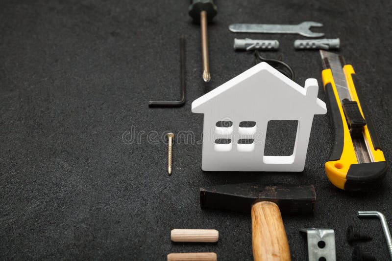 Het houten concept van de huisbouw, diy woningbouw stock afbeelding Het houten concept van de huisbouw, diy woningbouw stock afbeelding