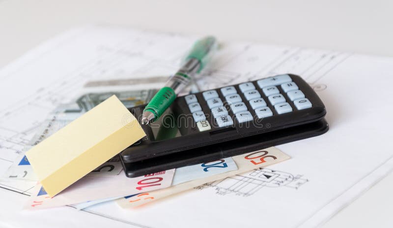Het huiskosten van de planning stock afbeelding Het huiskosten van de planning stock afbeelding