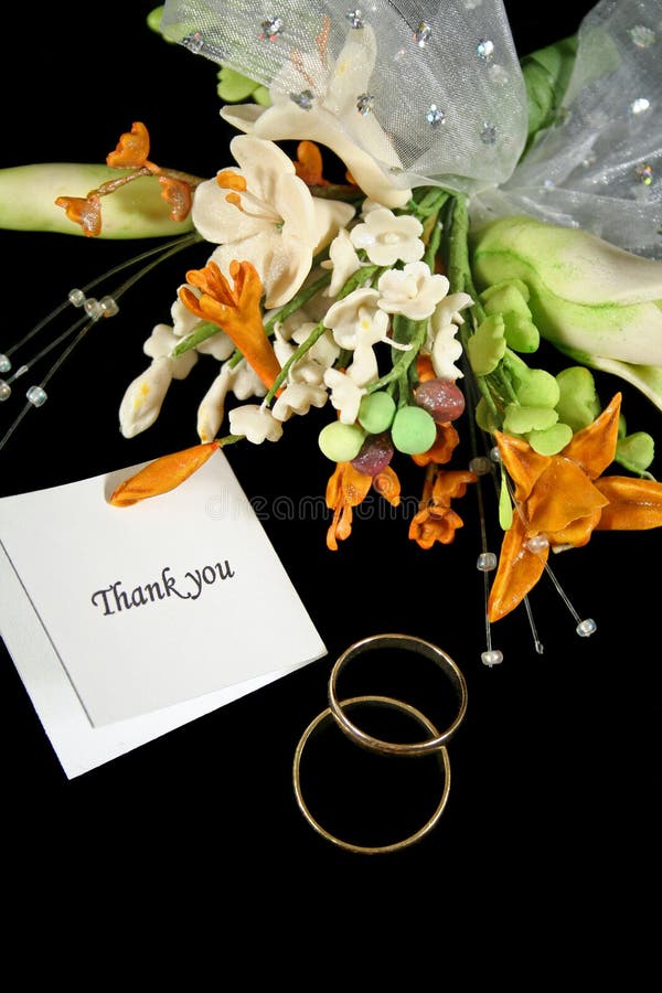 Wedding thank you with rings and bouquet. Wedding thank you with rings and bouquet.