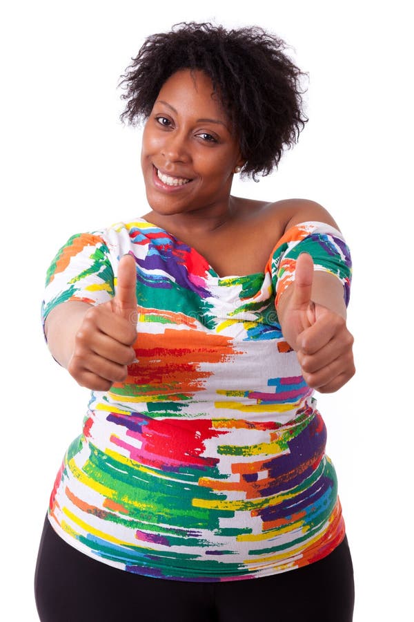 Young fatty black woman making thumbs up gesture , isolated on white background - African people. Young fatty black woman making thumbs up gesture , isolated on white background - African people
