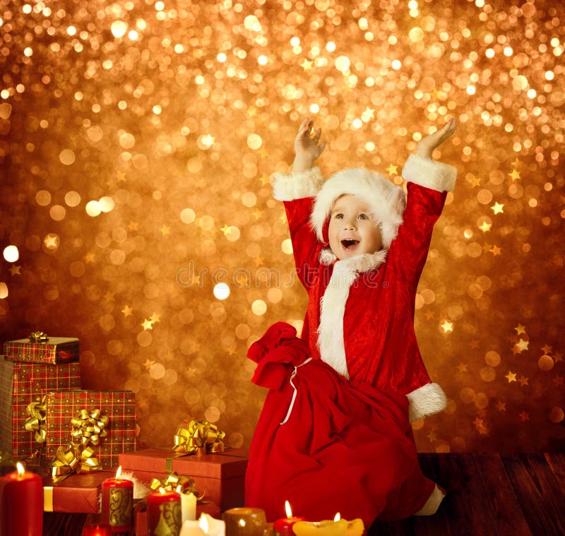 Het Kerstmisjonge geitje, Gelukkig Kind stelt omhoog voor Giften, Rode Santa Bag, Jongenswapens