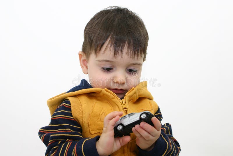 Het Kind van de jongen in de Kleren van de Daling stock afbeeldingen Het Kind van de jongen in de Kleren van de Daling stock afbeeldingen