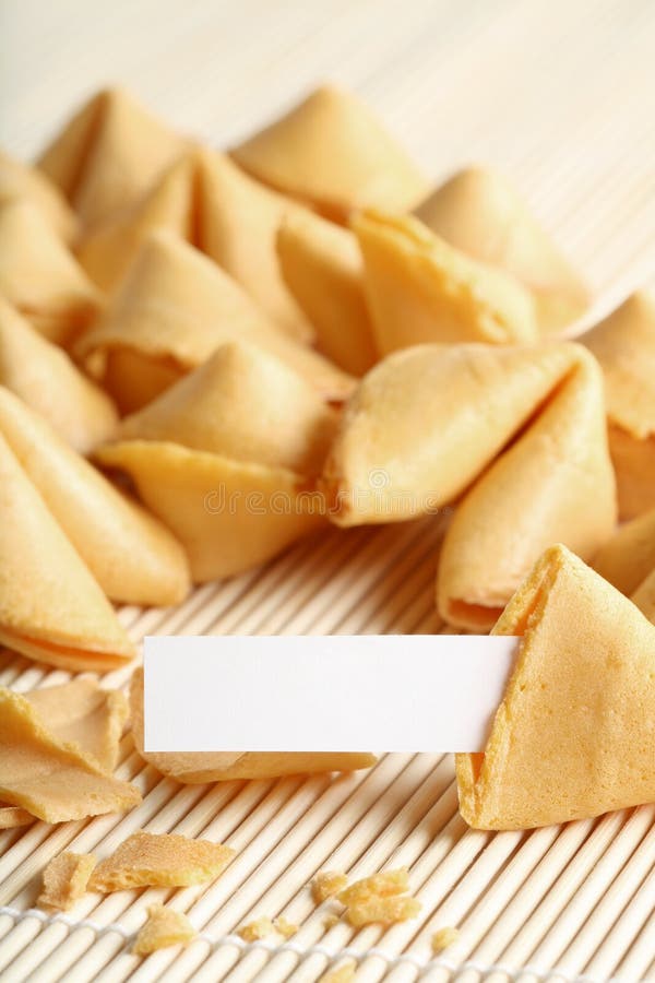 Fortune cookie open with paper and space for text, whole text area in focus. Fortune cookie open with paper and space for text, whole text area in focus