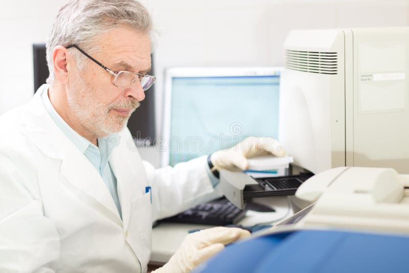 Life science researcher performing a genotyping testing which enables personalized medicine. PM is a medical model that proposes the customization of healthcare. Life science researcher performing a genotyping testing which enables personalized medicine. PM is a medical model that proposes the customization of healthcare.