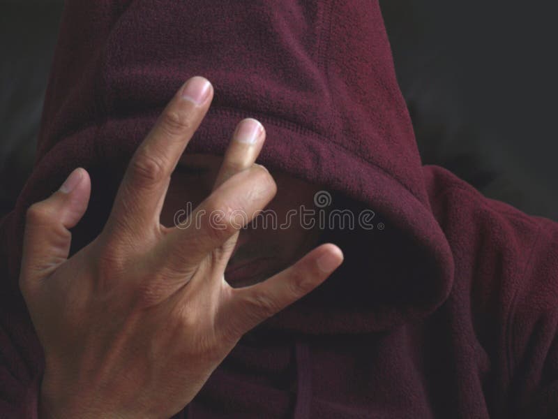 Het lid van de troep met een handteken stock foto Het lid van de troep met een handteken stock foto