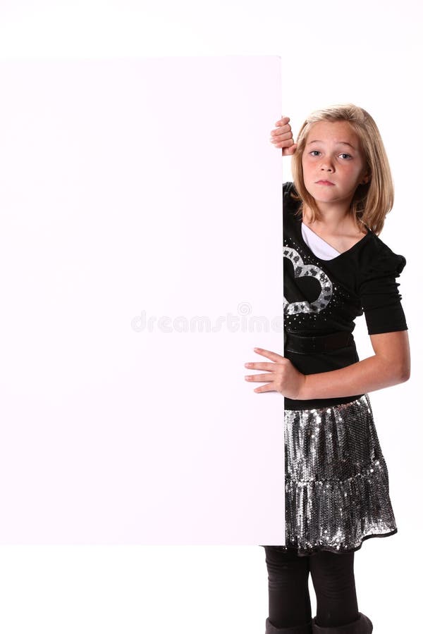 Het Meisje dat van Preteen een Teken houdt stock fotografie Het Meisje dat van Preteen een Teken houdt stock fotografie