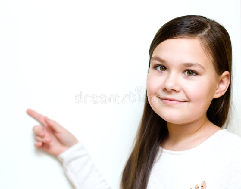 Het meisje houdt haar gezicht in verbazing stock foto Het meisje houdt haar gezicht in verbazing stock foto