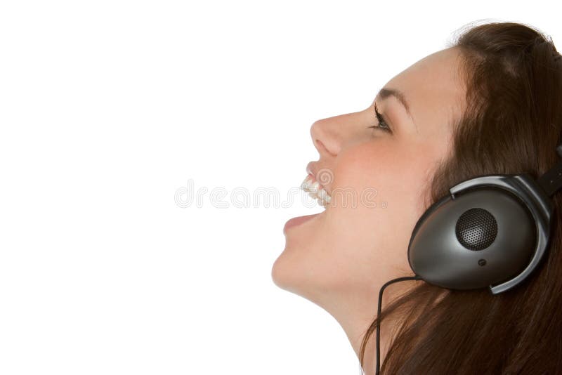 Girl listening to music on headphones. Girl listening to music on headphones