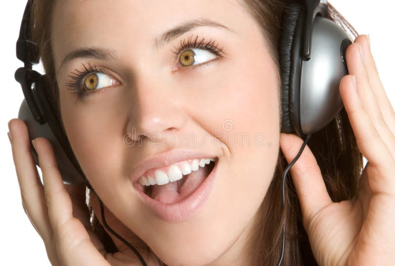 Girl listening to music on headphones. Girl listening to music on headphones