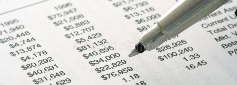 Still-life of Financial Statement (focus on the tip of pen). Still-life of Financial Statement (focus on the tip of pen)