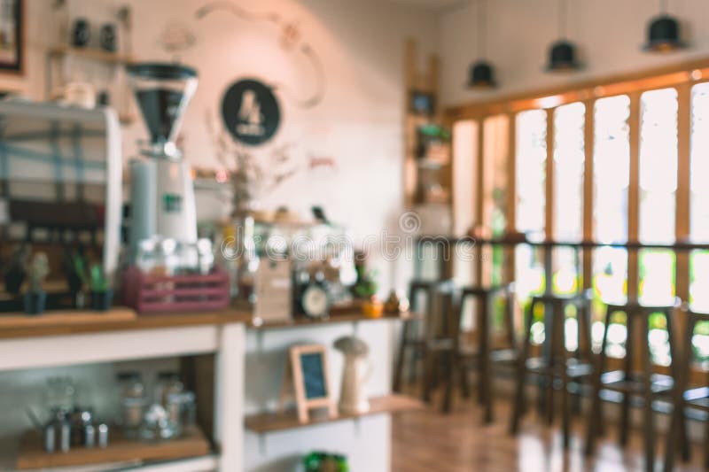 Het onduidelijke beeldachtergrond van de koffiewinkel royalty-vrije stock foto's Het onduidelijke beeldachtergrond van de koffiewinkel royalty-vrije stock foto's