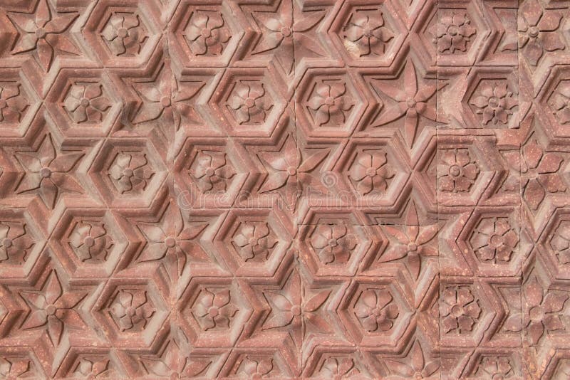 Het oude patroon van de qutub minar muur royalty-vrije stock afbeelding Het oude patroon van de qutub minar muur royalty-vrije stock afbeelding