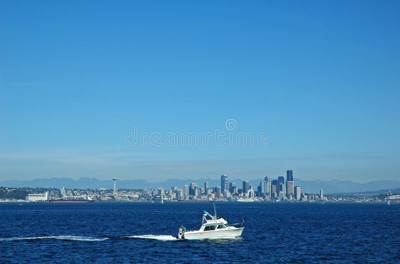 Pleasure boat cruising by Seattle, WA. Pleasure boat cruising by Seattle, WA