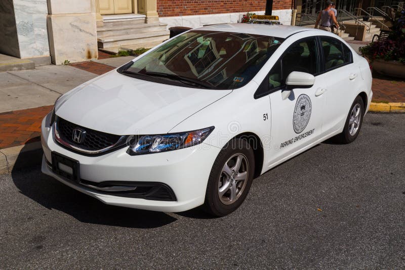 Lancaster, PA – August 4, 2016: A parking enforcement officer’s vehicle in the City of Lancaster. Lancaster, PA – August 4, 2016: A parking enforcement officer’s vehicle in the City of Lancaster.