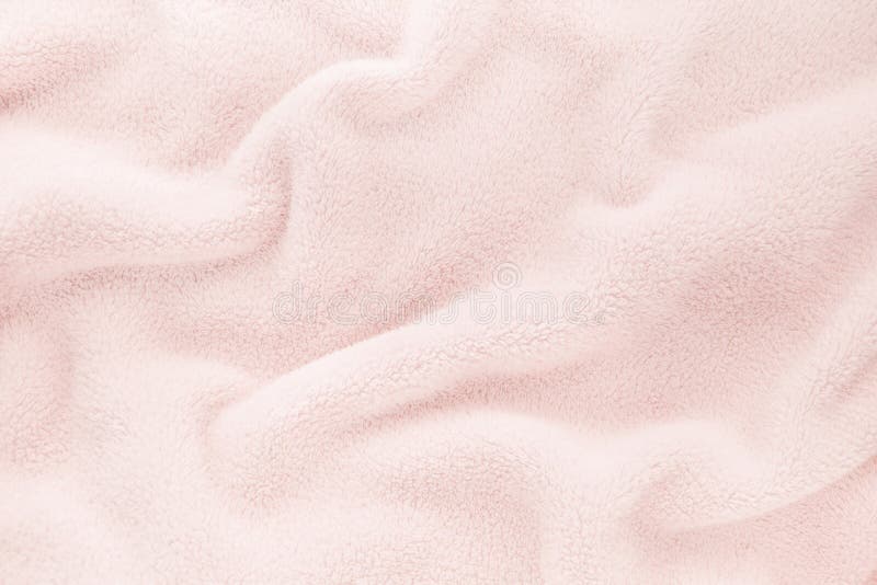 Fluffy Gentle baby pastel pink rose fabric with waves and folds. Soft pastel textile texture. Folds on the soft fabric. Rose towel terry cloth. Fluffy Gentle baby pastel pink rose fabric with waves and folds. Soft pastel textile texture. Folds on the soft fabric. Rose towel terry cloth.