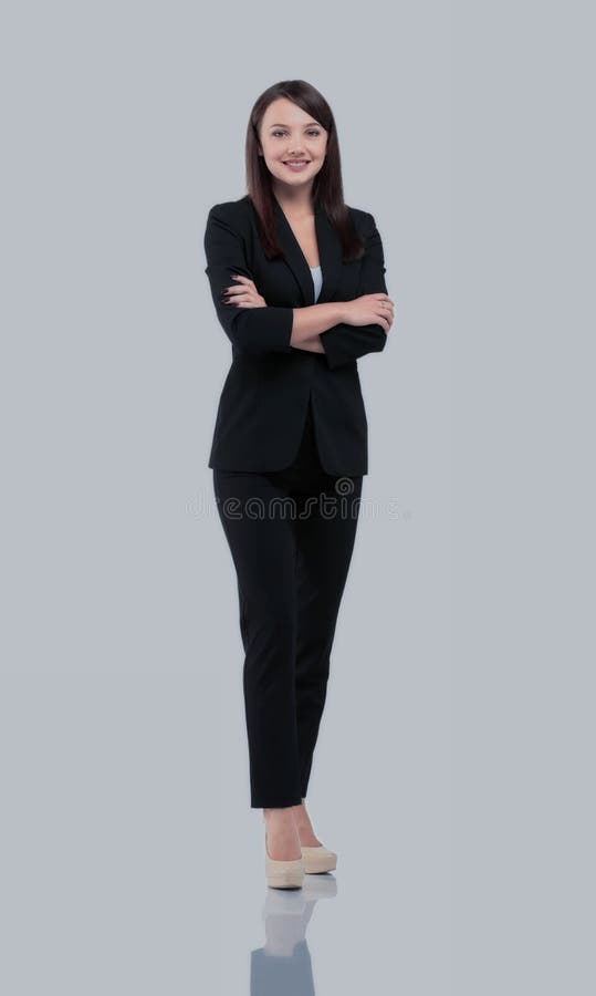 Het portret van jonge gelukkige glimlachende onderneemster in kostuum isoleerde a stock foto Het portret van jonge gelukkige glimlachende onderneemster in kostuum isoleerde a stock foto