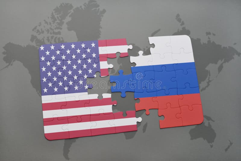 Het raadsel met de nationale vlag van de Verenigde Staten van Amerika en Rusland op een wereld brengen achtergrond in kaart stock afbeeldingen Het raadsel met de nationale vlag van de Verenigde Staten van Amerika en Rusland op een wereld brengen achtergrond in kaart stock afbeeldingen