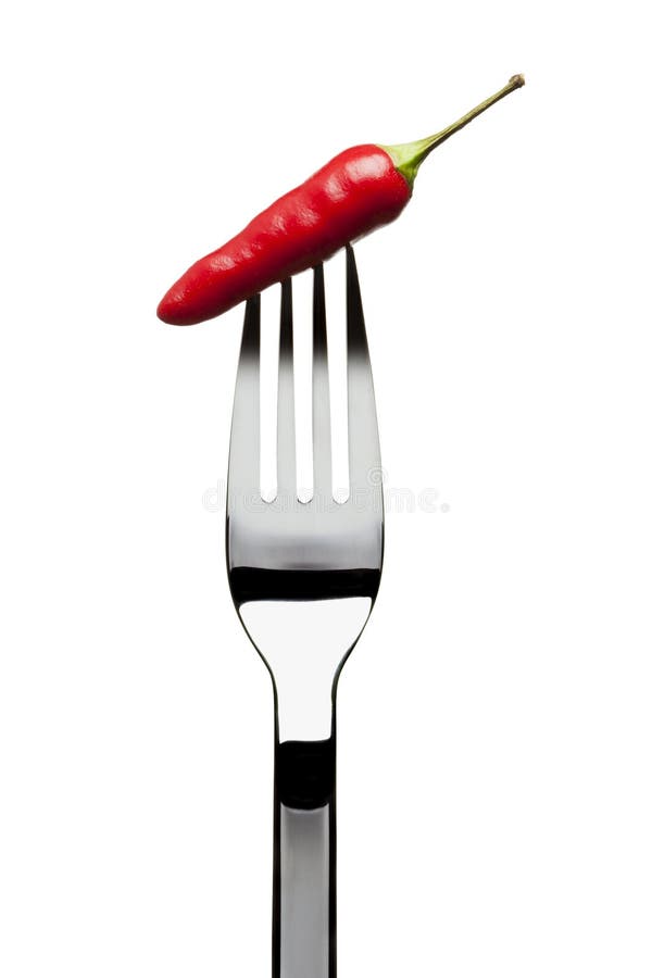 Het rode Spaanse peper plakken op vork stock foto's Het rode Spaanse peper plakken op vork stock foto's