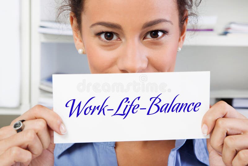 Work Life Balance - woman with sign in hands. Work Life Balance - woman with sign in hands