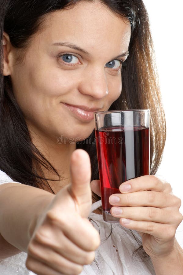 Het sap van de kers wordt verbruikt van een glas stock afbeeldingen Het sap van de kers wordt verbruikt van een glas stock afbeeldingen