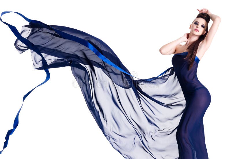 Het sexy jonge vrouw stellen in blauwe chiffon stock fotografie Het sexy jonge vrouw stellen in blauwe chiffon stock fotografie
