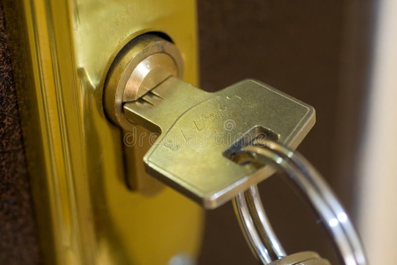 Home lock and key.Key close up. Home lock and key.Key close up.