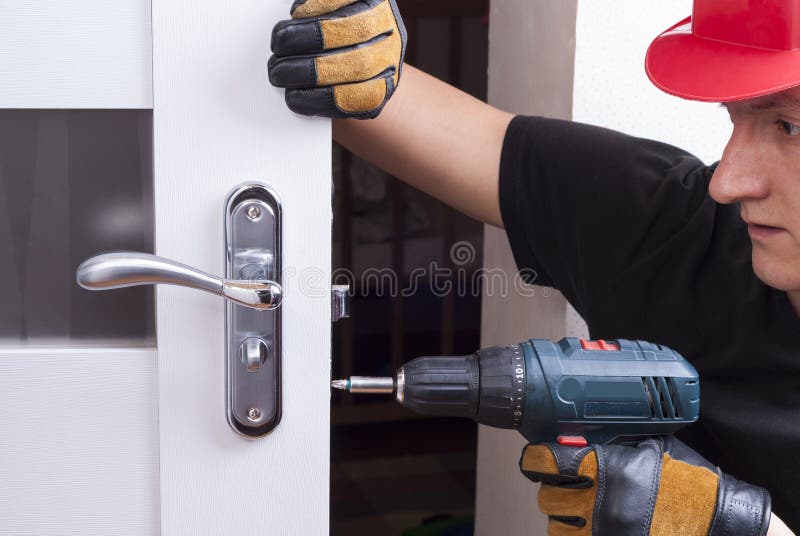 Het slot van de reparatiedeur stock afbeelding Het slot van de reparatiedeur stock afbeelding