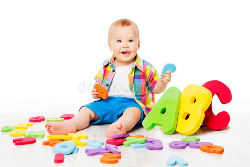 Het Speelgoed van het babyalfabet, Kind die Kleurrijke ABC-Brieven op Wit spelen stock fotografie Het Speelgoed van het babyalfabet, Kind die Kleurrijke ABC-Brieven op Wit spelen stock fotografie