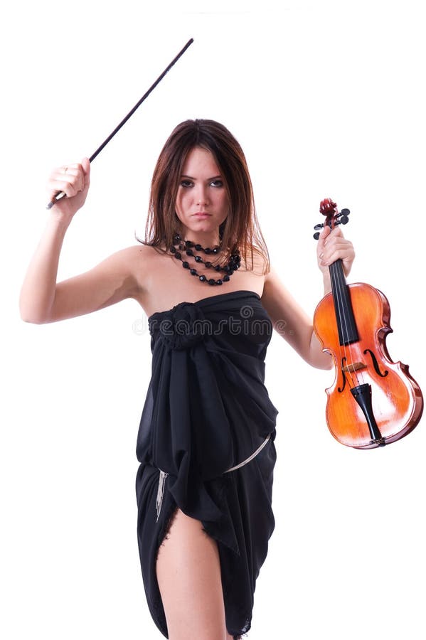 The strict girl. Beautiful brunette girl with violin standing on white background. The strict girl. Beautiful brunette girl with violin standing on white background