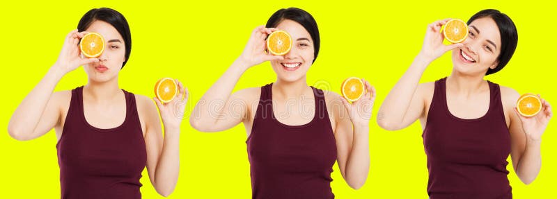 Het vastgestelde Aziatische meisje met mooie duidelijke huid houdt vruchten op gele achtergrond - gezondheid en gewichtsverliesco stock foto Het vastgestelde Aziatische meisje met mooie duidelijke huid houdt vruchten op gele achtergrond - gezondheid en gewichtsverliesco stock foto