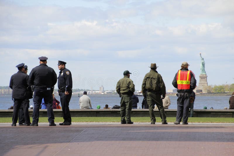 Law enforcement officers waiting the space shuttle flyover Statue of Liberty Image taken 4/27/12. Law enforcement officers waiting the space shuttle flyover Statue of Liberty Image taken 4/27/12