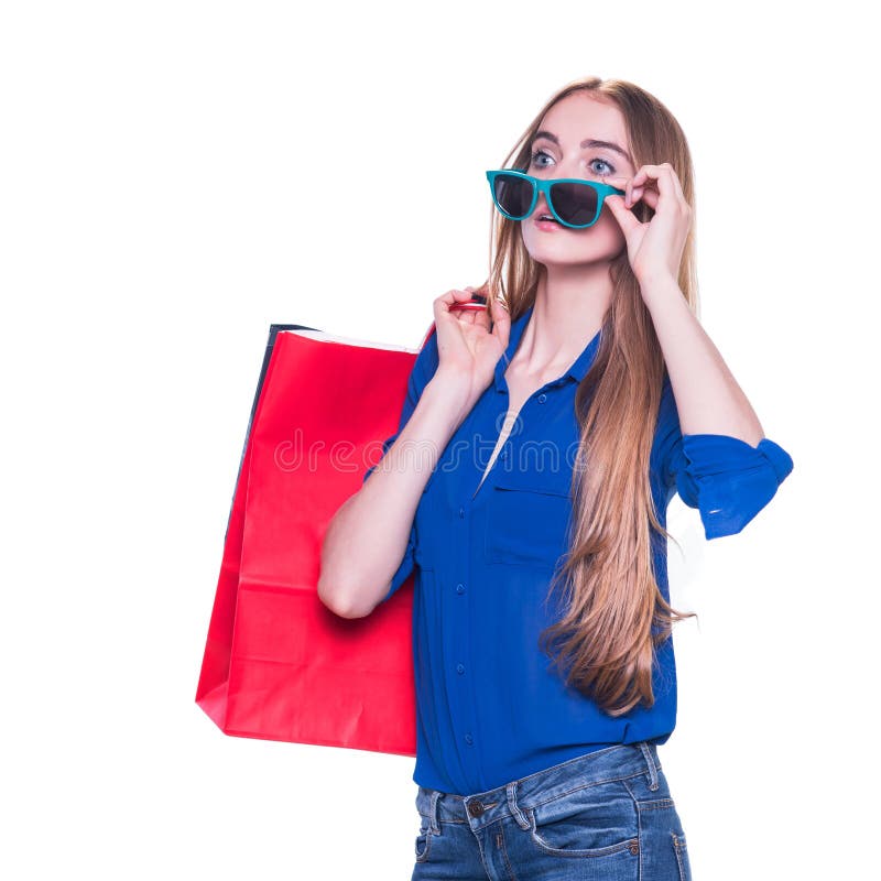 Het winkelen vrouw gelukkige het glimlachen holding het winkelen zakken en weggegaan over verkoop royalty-vrije stock fotografie Het winkelen vrouw gelukkige het glimlachen holding het winkelen zakken en weggegaan over verkoop royalty-vrije stock fotografie