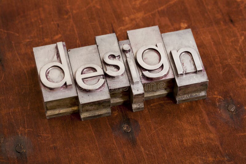Het woord van het ontwerp in metaal en hout stock afbeeldingen Het woord van het ontwerp in metaal en hout stock afbeeldingen