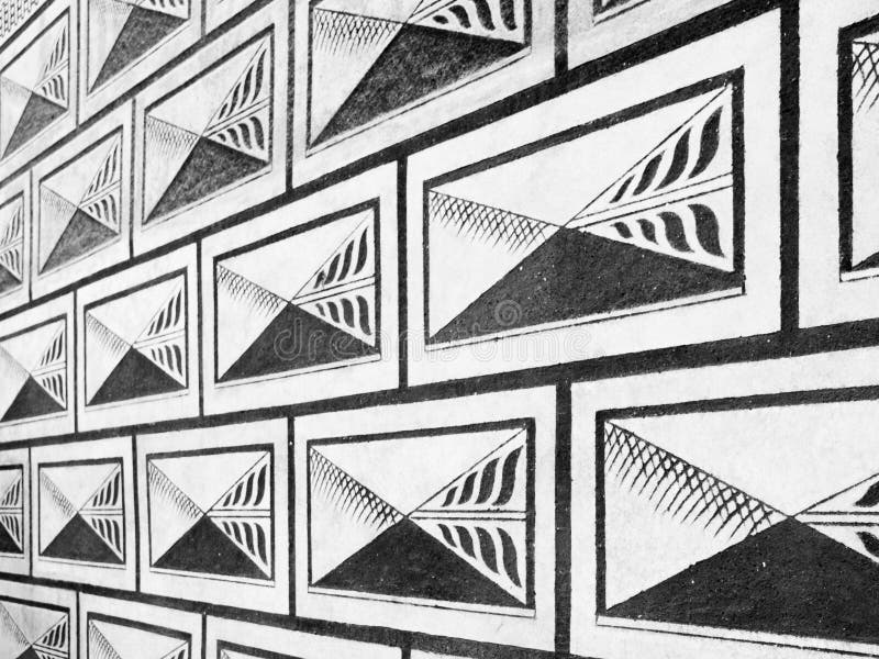 Het zwart-witte sgraffito patroon van de renaissancebrief van de voorgevel stock fotografie Het zwart-witte sgraffito patroon van de renaissancebrief van de voorgevel stock fotografie
