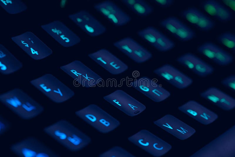 Hi tech computer mechanical keyboard with backlight rgb illumination. Close up of computer gaming accessory.