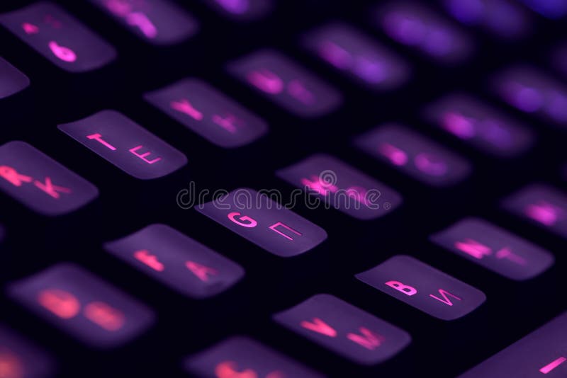 Hi tech computer mechanical keyboard with backlight rgb illumination. Close up of computer gaming accessory.
