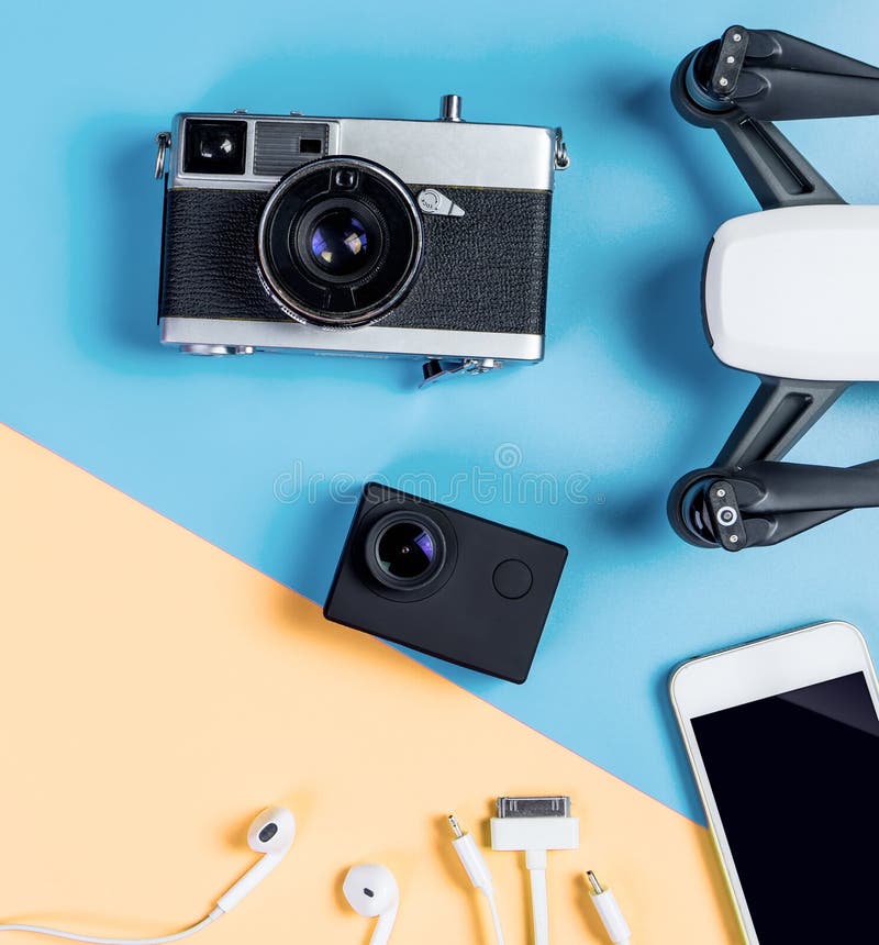 Hi Tech Travel Gadget Accessories on Blue and Yellow Copy Space Stock